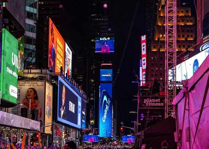 Landmark digital screens lighting up Times Square at night